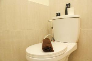 Cozy Living and Tidy 1BR Meikarta Apartment By Travelio