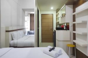 Convenient Studio Apartment at Vida View Makassar By Travelio