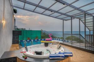 SaffronStays Skyfall - 4BR boho-chic villa with pool, jacuzzi, game room & stunning hill views near Table Land, Panchgani