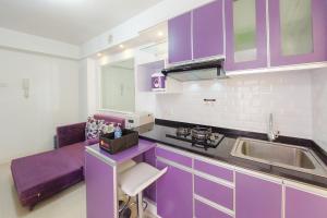 Comfort 2BR Apartment at Bassura City By Travelio