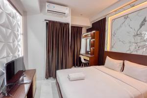 Cozy Studio Apartment Delft Ciputra Makassar By Travelio