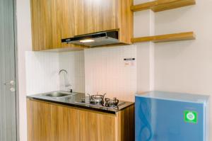 Comfy Studio at Amazana Serpong Apartment By Travelio