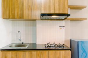 Comfy Studio at Amazana Serpong Apartment By Travelio