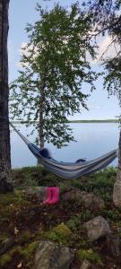 Traditional Finnish lakeside off-grid cabin