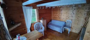 Traditional Finnish lakeside off-grid cabin