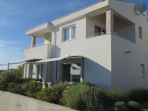 Ferienhaus am Meer - Rtina