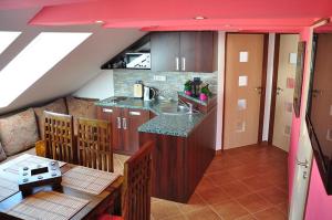 Two-Bedroom Apartment with Balcony room in Penzion Farma