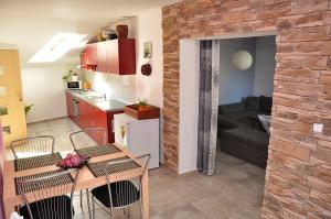 Three-Bedroom Apartment room in Penzion Farma