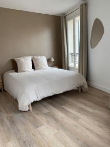 Appartements Charmant 2 pieces renove parc des expositions porte de Versailles : photos des chambres