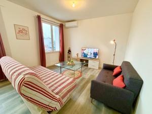 Appartements Le Corail, Appartement Confort, Centre-ville : photos des chambres