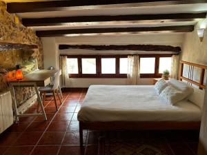 Rural Stone House with wood fireplace