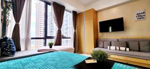 xxxCozy Family Retreat 8 mins walk from Venice Grand Canal Mall BGC fits 5 pax