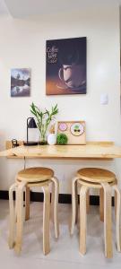 xxxCozy Family Retreat 8 mins walk from Venice Grand Canal Mall BGC fits 5 pax