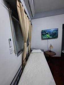 Obelisco Céntrico y familiar