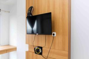 Fancy and Elegant Studio at Patraland Urbano Apartment By Travelio