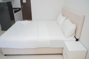 Nice and Modern Studio at Transpark Bintaro Apartment By Travelio