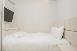 Comfort and Simply 2BR at Green Bay Pluit Apartment By Travelio