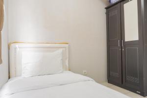 Comfort and Simply 2BR at Green Bay Pluit Apartment By Travelio