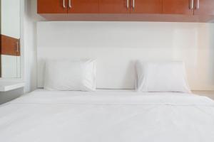 Compact and Cozy Studio Apartment at Orchard Supermall Mansion By Travelio