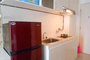 Compact and Cozy Studio Apartment at Orchard Supermall Mansion By Travelio