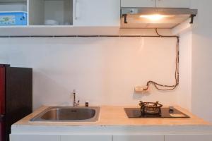 Compact and Cozy Studio Apartment at Orchard Supermall Mansion By Travelio