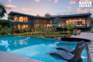 StayVista at Sol & Sands with Mountain View and Pool - Chorondpāda