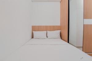 Simply Look and Warm 2BR at Serpong Garden Apartment By Travelio