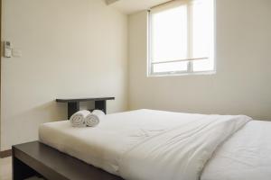 Cozy Stay 1BR at Maple Park Sunter Apartment By Travelio
