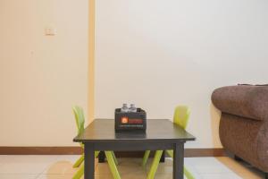 Cozy Stay 1BR at Maple Park Sunter Apartment By Travelio