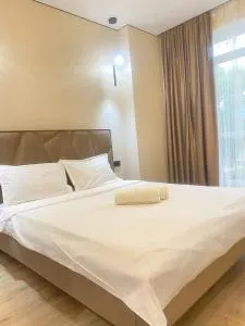 Просторная двухкомнатная квартира в ЖК Еламан - Oktryabr'