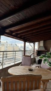 Agia Sofia Penthouse with view by Central Tags