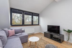 Charming 1-bedroom apartment by Noclegi Renters