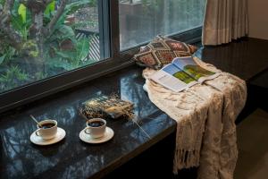 SaffronStays Red Brick House - 3BR English-style villa with verandah dining, orchard lawn & classic charm