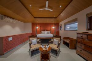 SaffronStays Red Brick House - 3BR English-style villa with verandah dining, orchard lawn & classic charm