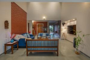 SaffronStays Red Brick House - 3BR English-style villa with verandah dining, orchard lawn & classic charm