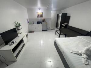 ห้องพักรายวันเมืองทองธานีตึกc5 (คุณแอ๊ด)