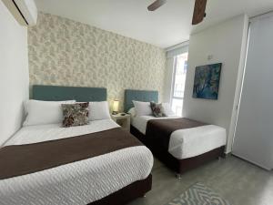 Ctgna 10 personas 3 habitaciones Playa Américas Morros