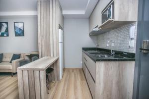 Studio com Cama de Casal e Sofá - ALL1621