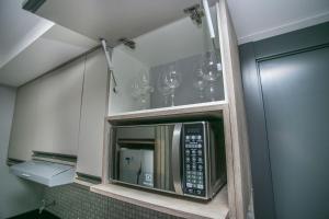 Studio com Cama de Casal e Sofá - ALL1621