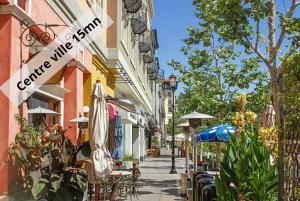 Appartements STUDIO COSY NEUF - FIBRE - PARKING GRATUIT - Proche ecoles et entreprises : photos des chambres