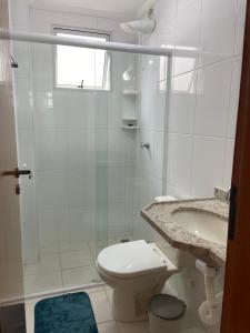 Apartamento a 100m da Praia Grande, churrasqueira, piscina e wi fi