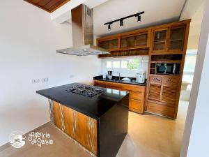 Linda casa com vista incrÃvel em condomÃnio no Sul da Ilha
