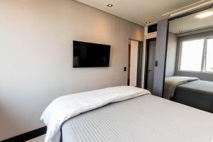 Flat equipado em otima localizacao, Wi-Fi e lazer