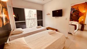 SUITES EM CANTOS Do MUNDO, ENCONTRE PAZ NESSA MICRO REGIÃO ECÓLOGICA, PRÓXIMO AS PRAIAS DO GUAÍUBA E DO TOMBO