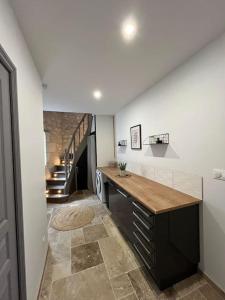 Maisons de vacances Charmante maison de bourg cosy acces wifi : photos des chambres