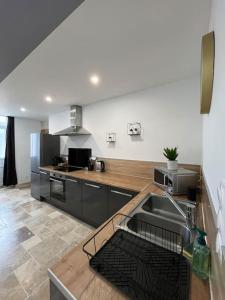Maisons de vacances Charmante maison de bourg cosy acces wifi : photos des chambres