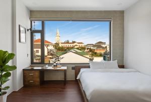 Phòng Deluxe 4 Người (Deluxe Quadruple Room)