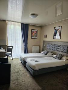 Hotels Cit'Hotel le Challonge : photos des chambres