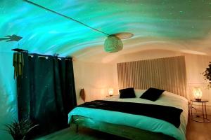 Maisons de vacances Le Patio - Cinelodge avec jardin : photos des chambres