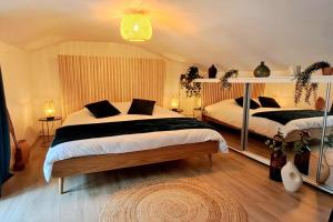 Maisons de vacances Le Patio - Cinelodge avec jardin : photos des chambres